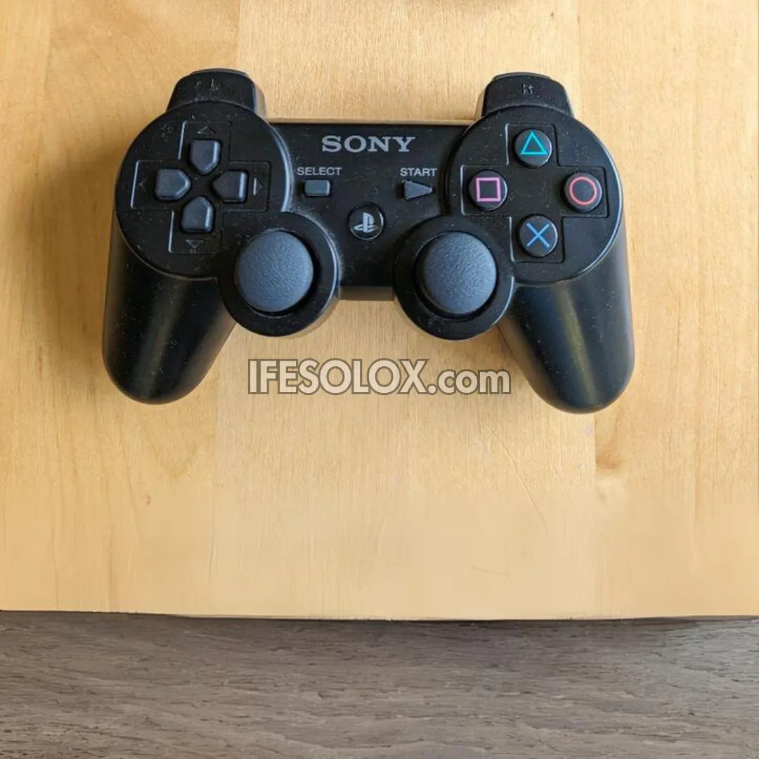 Sony Playstation 3 (PS3) Slim 500GB Game Console Complete Set with 2 DUALSHOCK Controllers and 30 Games - Foreign Used