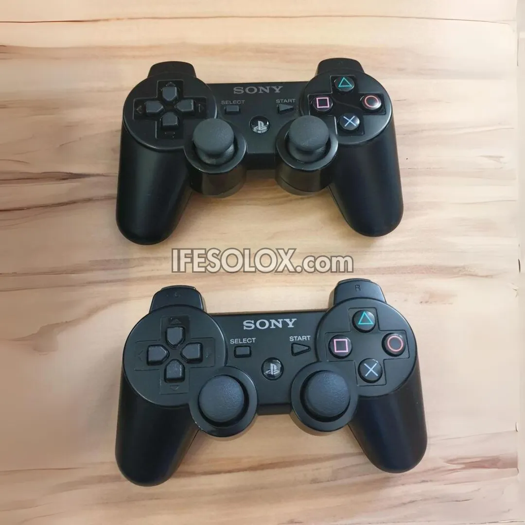 Sony Playstation 3 (PS3) Super Slim 500GB Game Console Complete Set with 2 DUALSHOCK Controllers and 30 Games - Foreign Used
